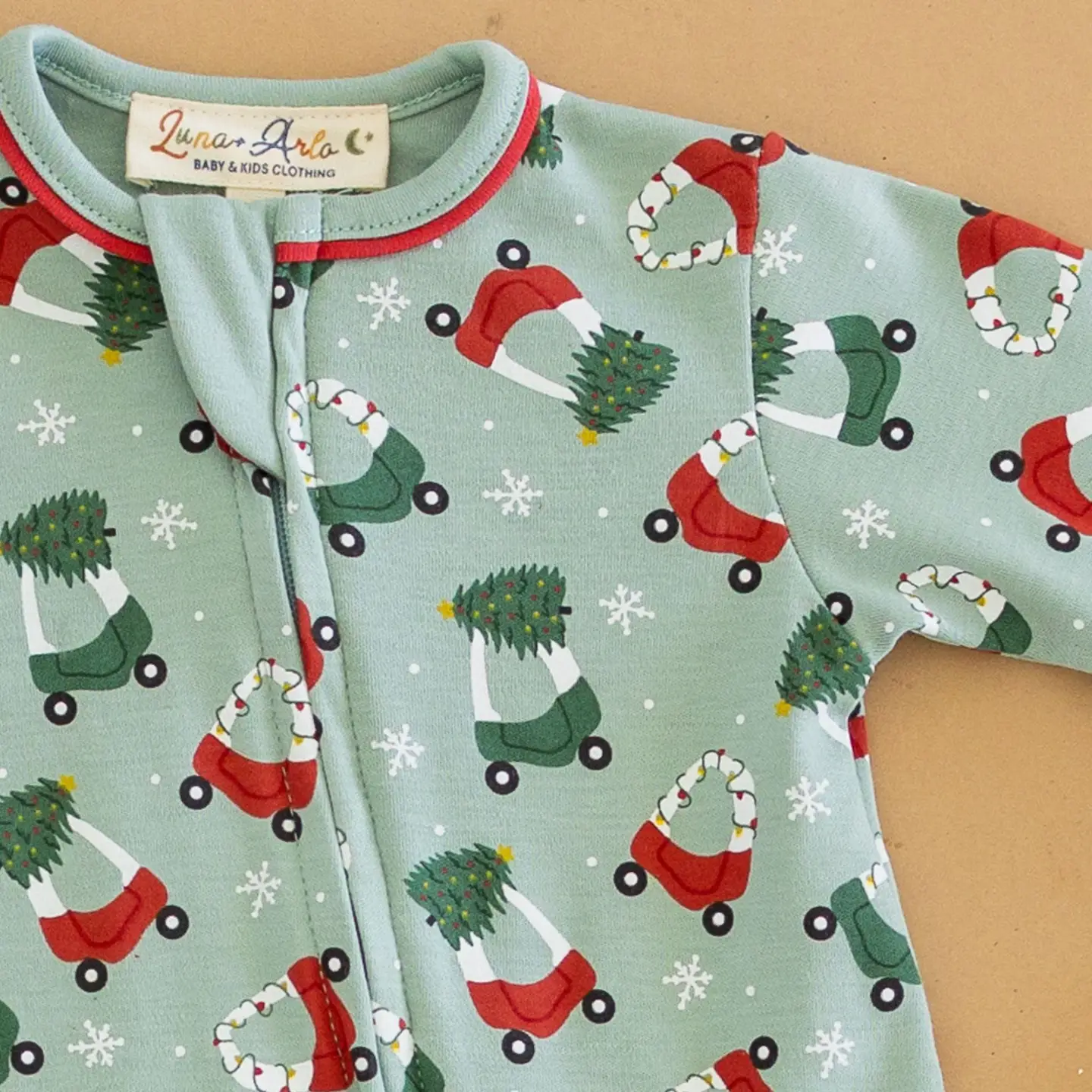 Deck the Wheels Zipper Footie